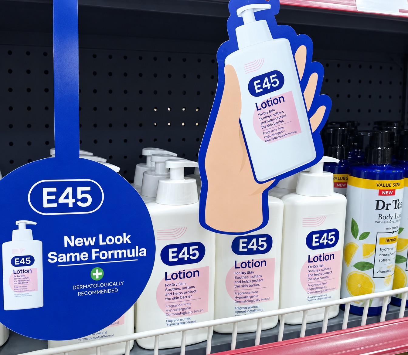 E45 Lotion in-store display: 'New Look, Same Formula' shelf signage above rows of E45 bottles